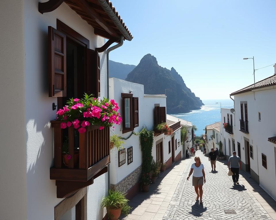 A stunning view of San Sebastián, La Gomera, showcasing hidden gems and local experiences. In the foreground, a traditional Canarian wooden balcony adorned with colorful flowers, inviting you into the scene. The middle ground features a quaint cobblestone street lined with charming whitewashed buildings, complete with wooden shutters and lush greenery. In the background, dramatic cliffs rise against a clear blue sky, highlighting the island's rugged natural beauty. Gentle sunlight bathes the scene in a warm glow, casting soft shadows that evoke a cozy, serene atmosphere. A few locals in modest casual clothing mingle, capturing the authentic, laid-back vibe of the town. The image should evoke a sense of discovery and wonder, inspiring viewers to explore the hidden corners of San Sebastián.